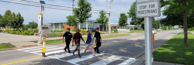 image of pedestrians in a marked crosswalk