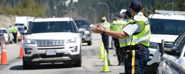 image of a police road check in progress