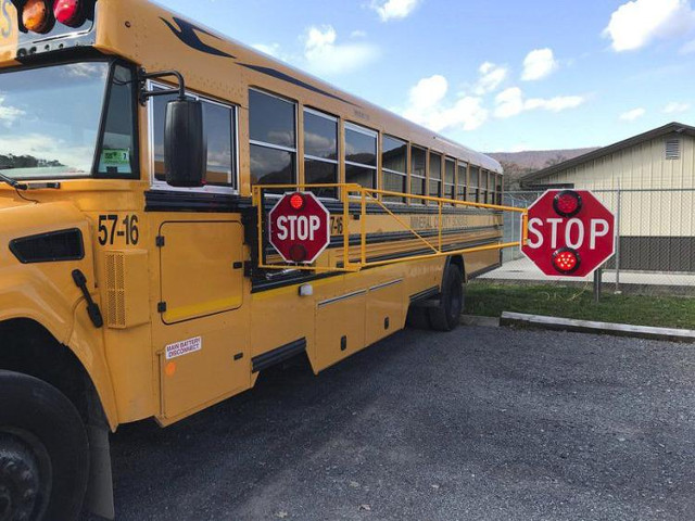 school bus stop sign