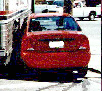 rear view of car vs bus collision